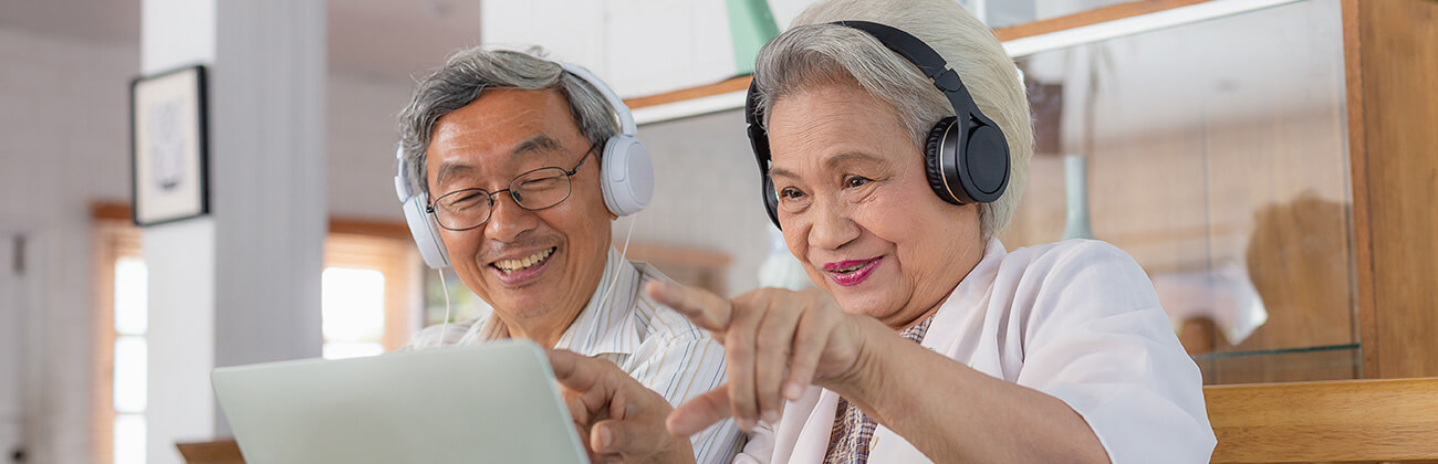 senior couple keeps in touch with family online