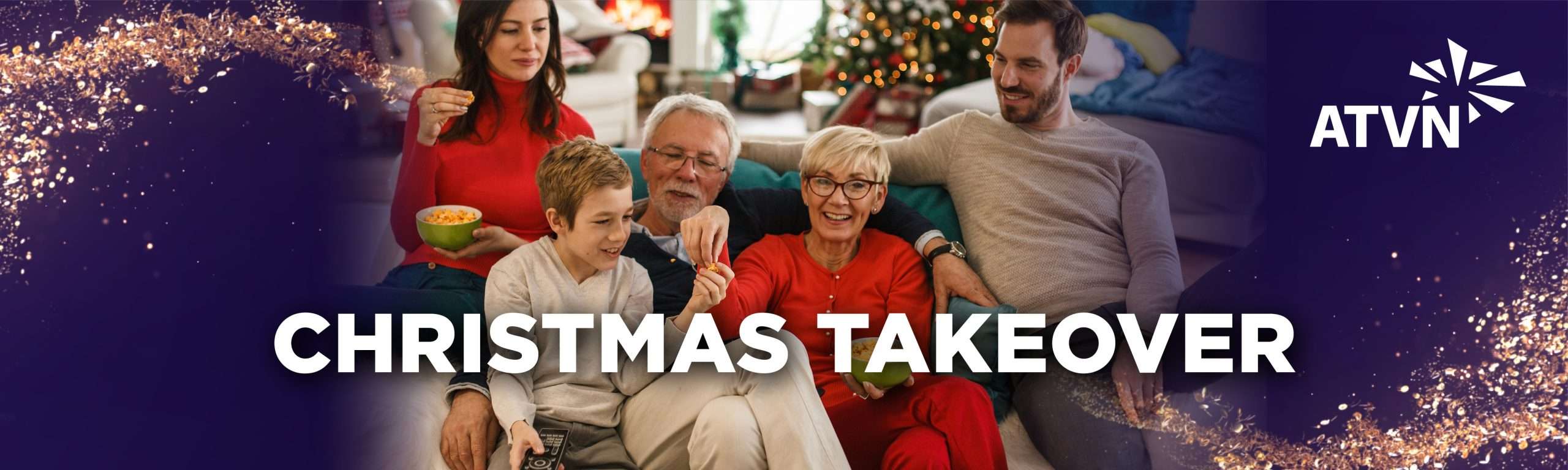 three generations of a family sitting on a couch during christmas eating popcorn with the words 