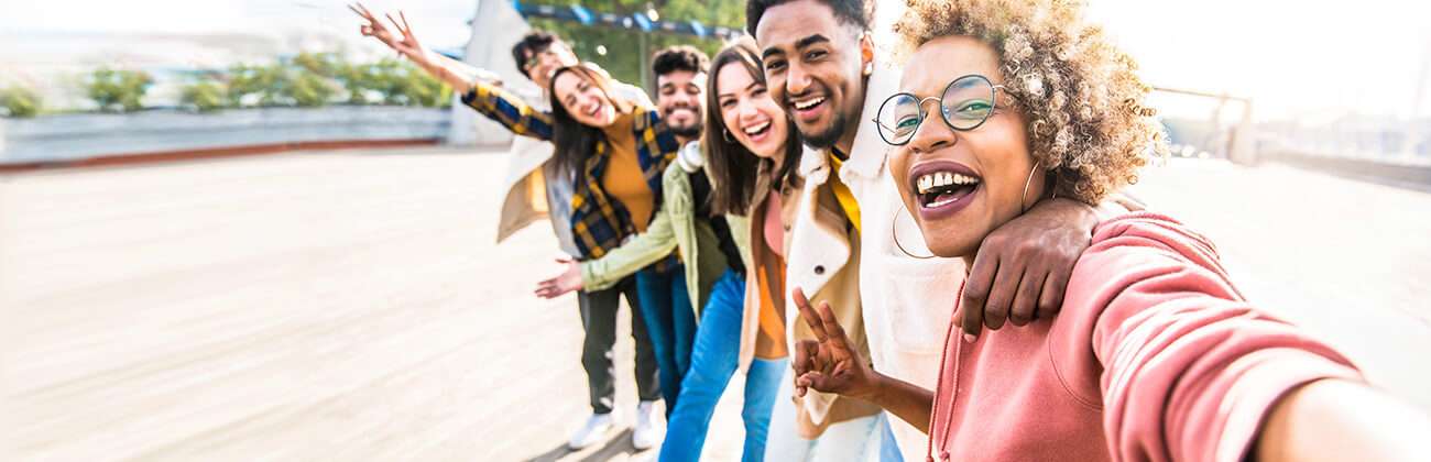 Group selfie with multiracial friend group