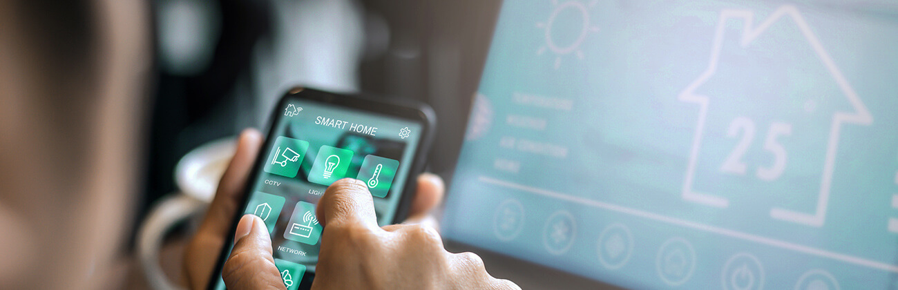 Person with smart home app customizes IoT appliance and device settings on their cell phone