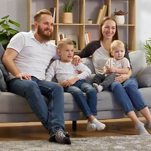 March family sitting on a couch