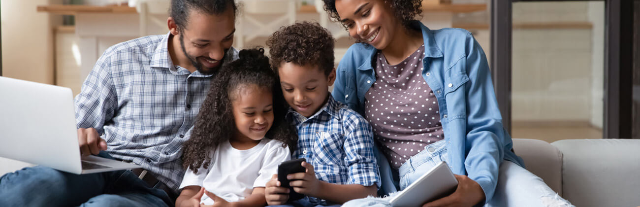 family looking at phone